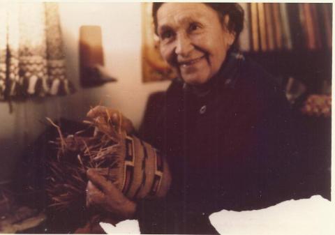 Lilly "Tootsie" Fawcett Holding a Basket she is Weaving