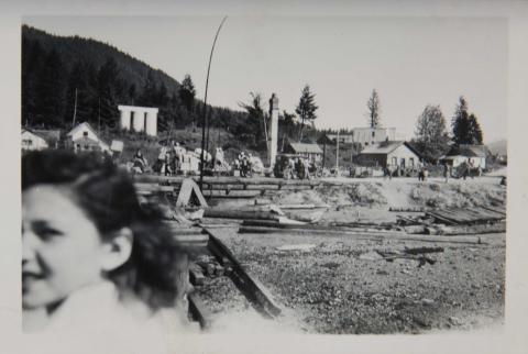 Woman with Post Fire Relief in the Background