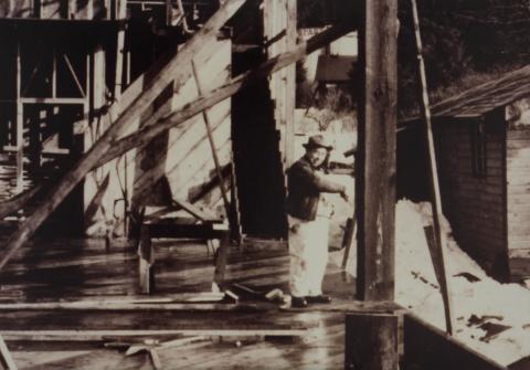 David Williams Standing in the ANB Hall Under Construction
