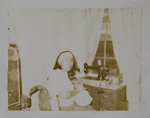 Young Esther Kaze at the Sewing Machine